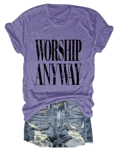 Flat lay of purple 'Worship Anyway' cotton t-shirt paired with frayed denim shorts