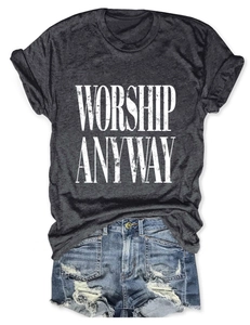 Close-up of WORSHIP ANYWAY print on dark grey t-shirt with distressed denim shorts