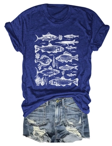 Detail of blue t-shirt with fish and seaweed illustration paired with denim shorts