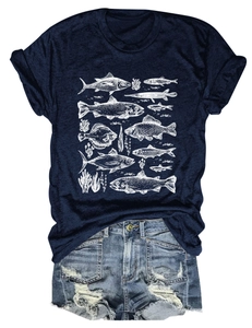 Detail of navy T-shirt with white sea fish print paired with frayed denim shorts