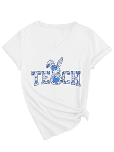 Detail of white V-neck T-shirt featuring blue floral TEACH print and rabbit graphic