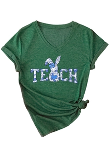 Detail of V-neck dark green T-shirt featuring TEACH text and blue floral rabbit silhouette