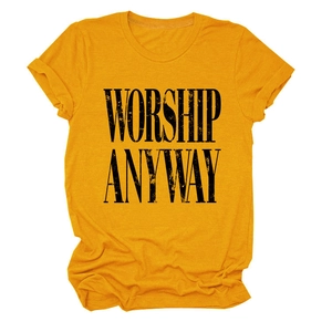 Flat lay of mustard yellow cotton T-shirt featuring WORSHIP ANYWAY vintage graphic print