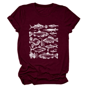 Close-up of hand-drawn fish and coral prints on a maroon cotton crewneck t-shirt