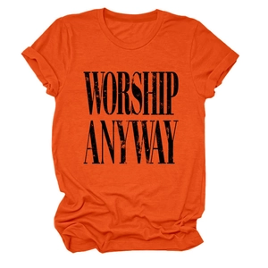 Detail of rolled sleeves and vintage WORSHIP ANYWAY print on bright orange cotton T-shirt