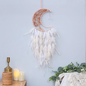 Pink crescent moon dream catcher with tree of life crystal and white feathers hanging