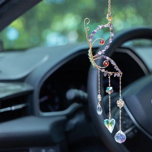 Handmade gold wire butterfly suncatcher with purple amethyst stones and crystal pendants