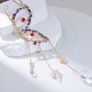 Handmade gold wire butterfly suncatcher with purple amethyst stones and crystal prisms