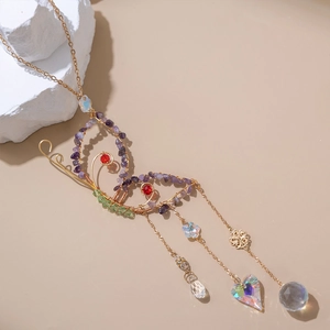 Handmade butterfly crystal suncatcher with gold wire wrap and colorful stones