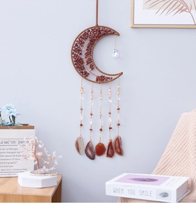 Detail of crescent moon tree of life wall hanging with natural agate slices