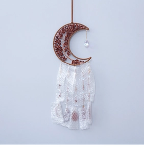 Handmade moon-shaped dream catcher with red crystal stones and crystal ball drop