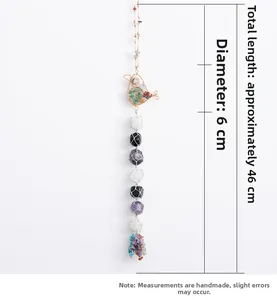 Detailed bird-shaped dream catcher with colorful gravel beads and hanging crystals
