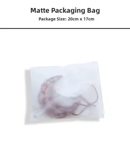 Frosted packaging bag for tree of life ornament measuring 20cm by 17cm for gift storage