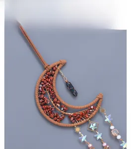 Moon-shaped Tree of Life wall hanging with red crystals and beaded tassels