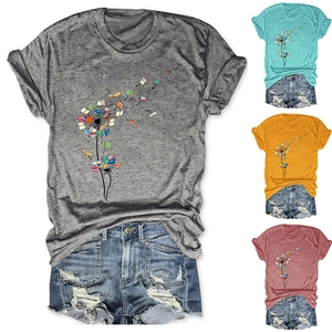 Detail view of dandelion book graphic on women's crew neck short sleeve tees in four colors