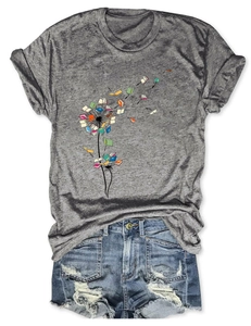 Detail of artistic dandelion book print on grey short sleeve cotton blend T-shirt
