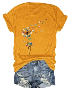 Detail of dandelion book print on ginger yellow cotton t-shirt with denim shorts