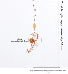Detailed view of handmade seahorse pendant with crystal beads measuring 30 cm long