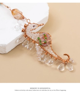 Exquisite handmade seahorse pendant with copper wire weaving and crystal beads details