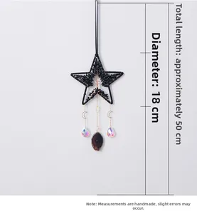 Star-shaped tree of life suncatcher detail with black obsidian stones and gold moon