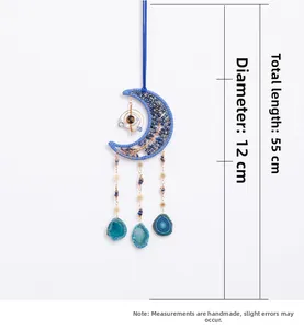Detailed view of handmade moon dreamcatcher wall hanging with dimensions 12cm by 55cm