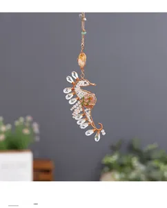 Detailed handmade metal wire seahorse pendant with crystals and natural stones