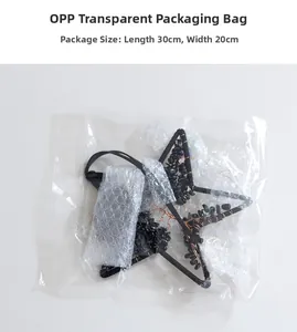 Star-shaped tree of life suncatcher with black crystals in protective OPP packaging