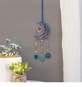 Handmade moon dream catcher with tree of life and natural blue agate slices hanging
