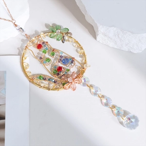 Handmade crystal suncatcher with colorful beads and faceted crystal ball prism