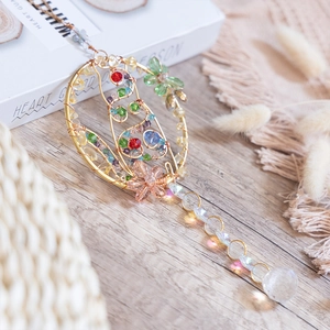 Handcrafted gold wire suncatcher with colorful crystal beads and faceted glass ball