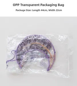Moon-shaped tree of life suncatcher detail with purple crystals in OPP packaging