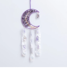 Detail of purple moon suncatcher featuring amethyst chips and woven life tree design