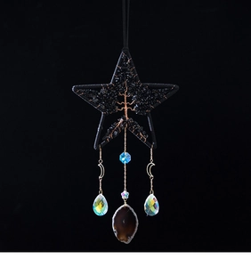 Detail of tree of life star suncatcher with black wire weaving and agate slice pendant