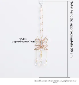 Detailed wire-wrapped butterfly suncatcher with pink beads and faceted crystal drops