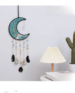Moon shaped tree of life suncatcher with turquoise stones and obsidian charms
