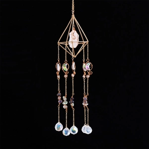 Bohemian gold suncatcher with raw crystal, rainbow moon pendants and hanging prisms