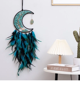 Moon shaped bohemian dreamcatcher wall hanging with tree of life and peacock blue feathers