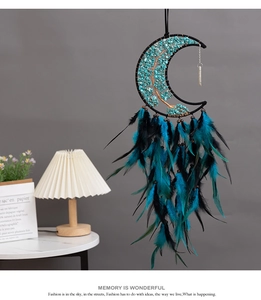Artistic moon-shaped dreamcatcher with turquoise stone tree of life and gradient feathers