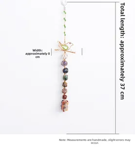 Detailed view of handmade bird chakra wall hanging with colorful raw stones and dimensions