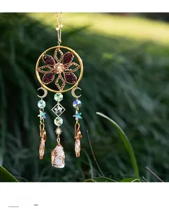 Handmade suncatcher dreamcatcher with natural crystal stones and celestial charms
