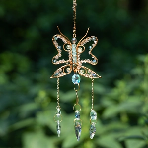 Handmade wire butterfly suncatcher with colorful beads and faceted crystal pendants