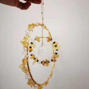 Hanging garden suncatcher with gold double metal rings and yellow crystal stones