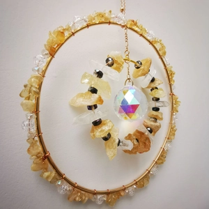 Rotating iron garden suncatcher with yellow crystals and iridescent glass prism ball