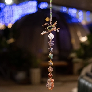 Handmade 7 Chakra crystal bird hanging ornament with colorful raw gemstones and wire wrap