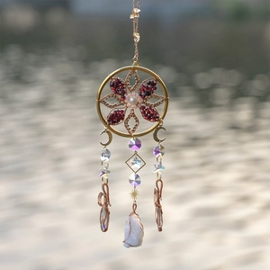 Bohemian suncatcher with natural crystal stone and metal sun moon star charms