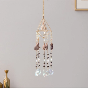 Detailed golden geometric prism with natural amethyst and crystal prism suncatcher