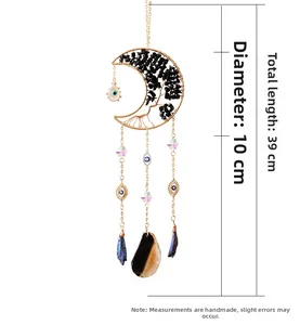 Black moon suncatcher with evil eye charm, measuring 10cm wide and 39cm in length