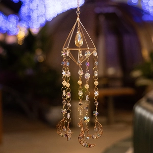Golden suncatcher featuring octahedron frame with natural colorful stones and moon pendants