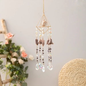 Bohemian crystal suncatcher with amethyst stones and golden geometric frame for garden decor