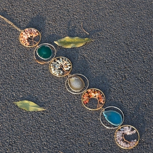 Handmade Tree of Life wind chime with colorful natural stones and agate slices hanging